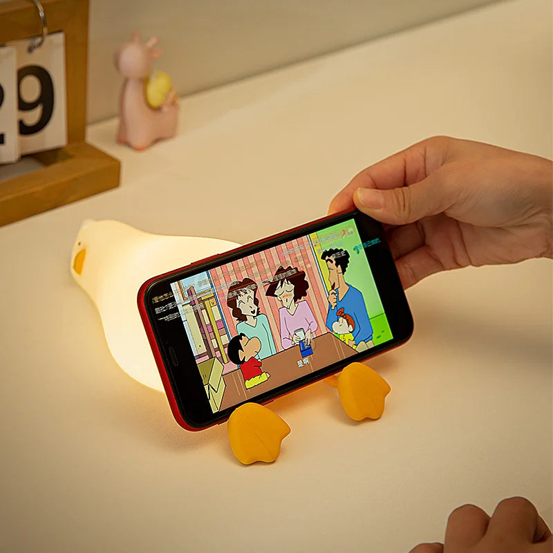 Luminária de Silicone em Formato de Pato com Suporte para Celular